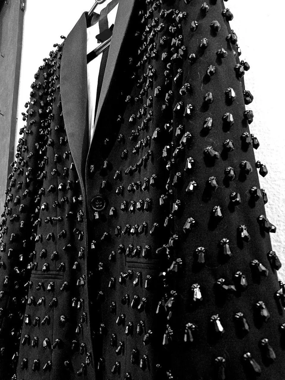 Black Coat with Heavy Black Stonework